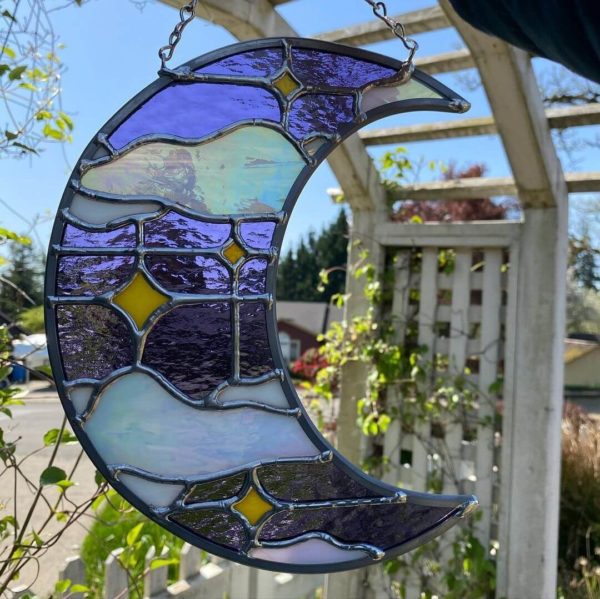Purple and white iridescent stained glass crescent moon suncatcher