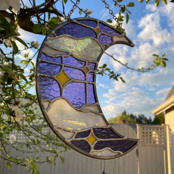 Purple and white iridescent stained glass crescent moon suncatcher